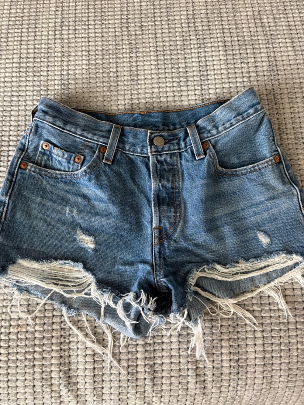 Levi's Distressed Medium Blue Denim Cutoff Shorts